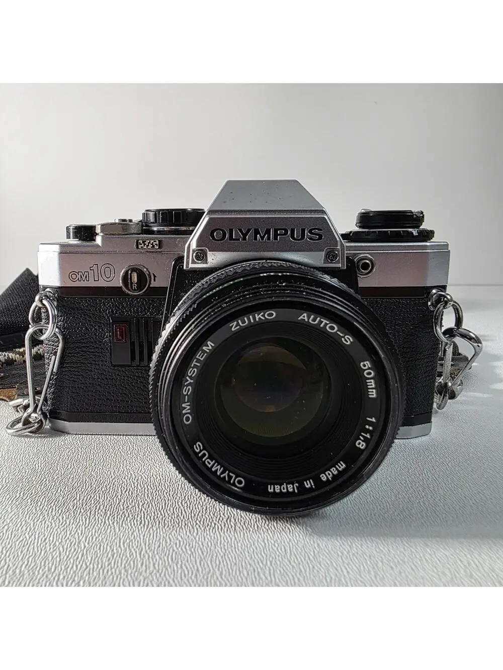 Olympus OM10 With Zuiko 50mm F1.8 Lens W/Neck Strap & Manual